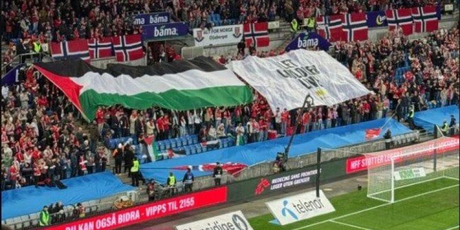 علم
      فلسطين
      يرفرف
      في
      مدرجات
      جماهير
      النرويج
      أمام
      أنظار
      منتخب
      الاحتلال - شبكة جدة الإخبارية